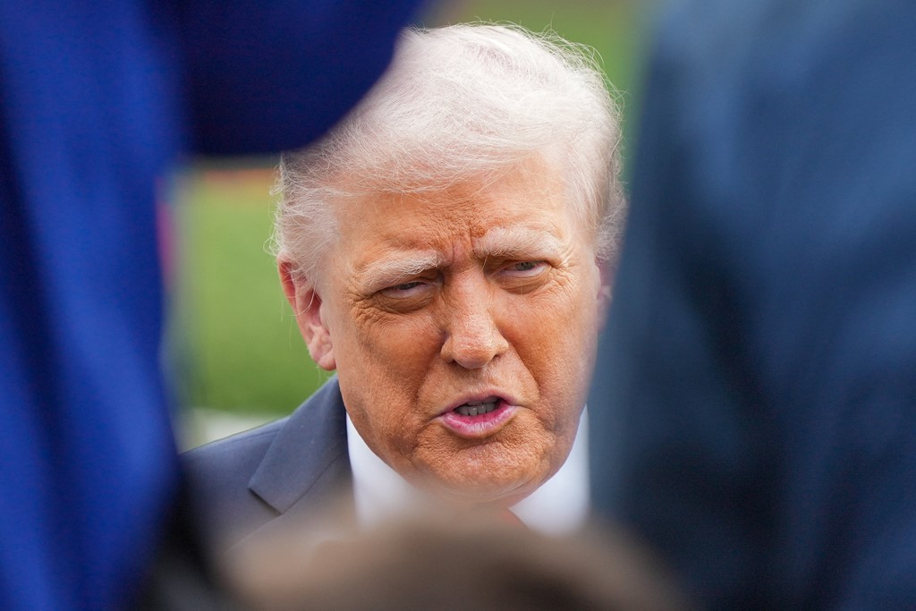 Trump at the White House before departing for the UK