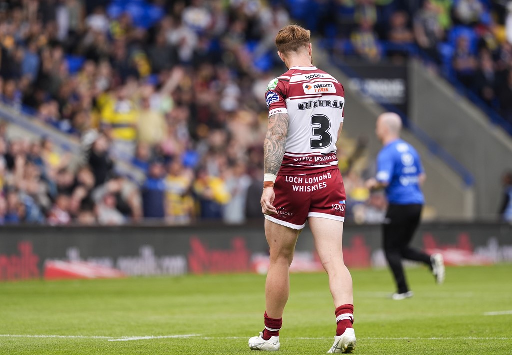 Adam Keighran leaves the field after being sent off