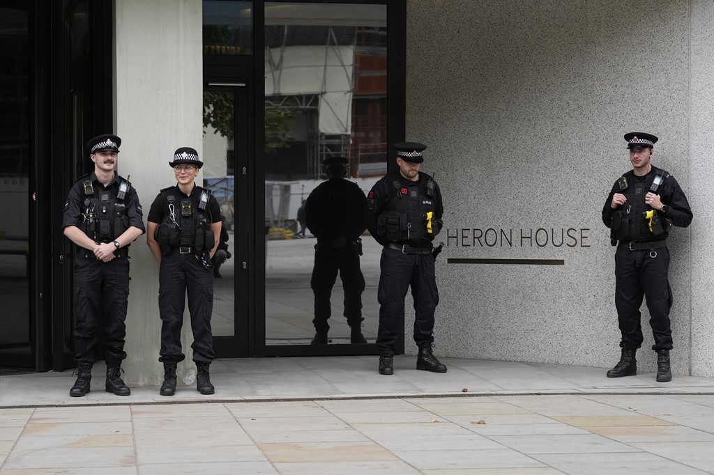 Armed officers outside of Number 10 North yesterday.