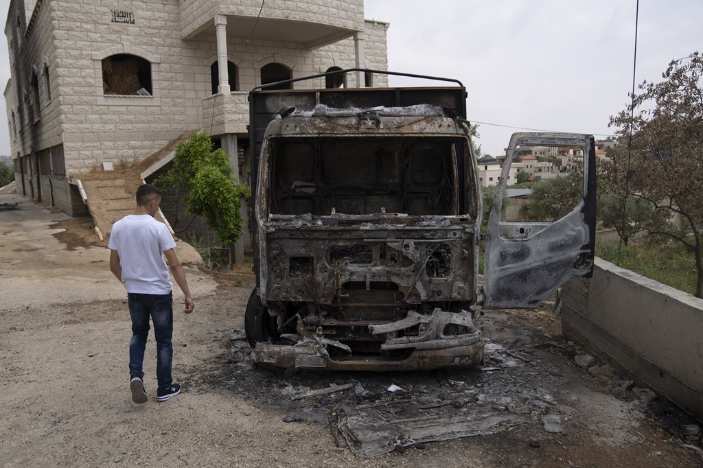Fatahi Mohammad's truck was torched by Israel settlers in Duma
