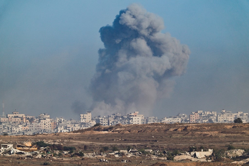 Smoke rises from Gaza after an explosion - as seen from the Israeli side of the border