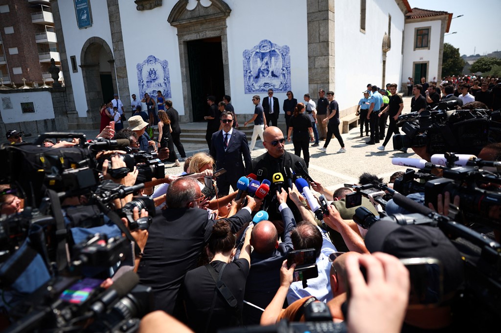 Roberto Martinez speaks to media after service