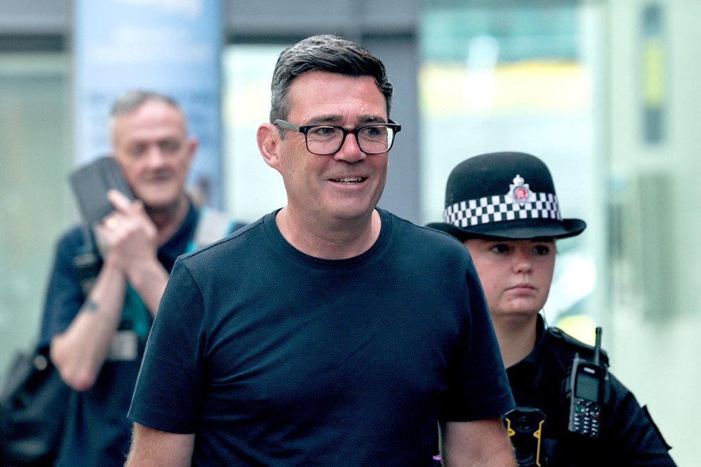Burnham in Manchester Piccadilly station this morning, beginning his journey to Westminster.