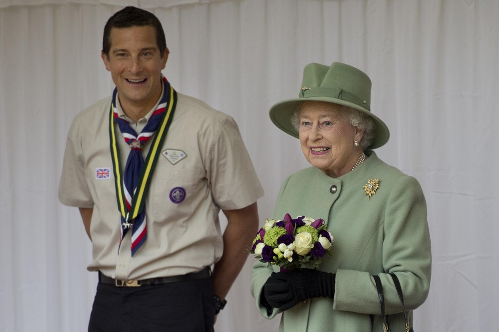 Pictured with the Queen in 2012