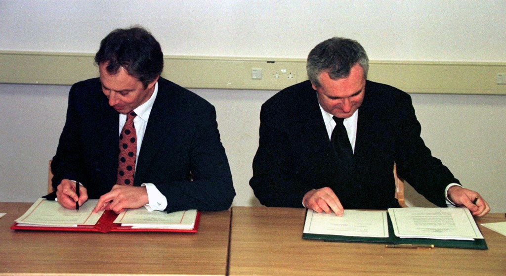 Tony Blair and Bertie Ahern, the Irish leader at the time, signing the agreement