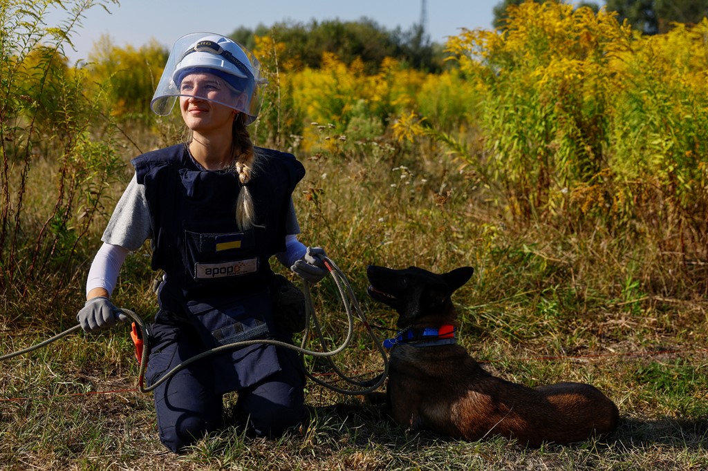 Viktoriia with her Belgian shepherd service dog Reia