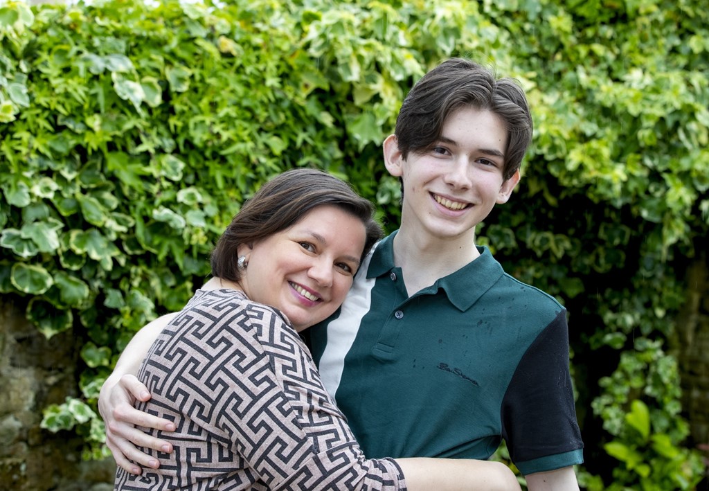 Oles Kuzomko with his mother Mila