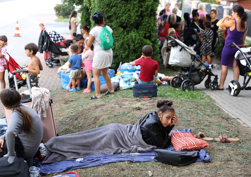 A Ukrainian woman sleeps rough after reportedly being evicted from subsidised accommodation