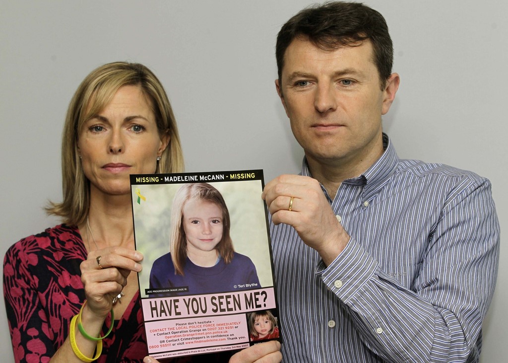 Kate McCann and husband Gerry in 2012 with an image of what Madeleine may have looked like then